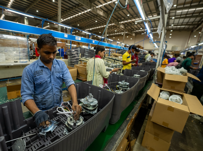 Workers on Assembly Line